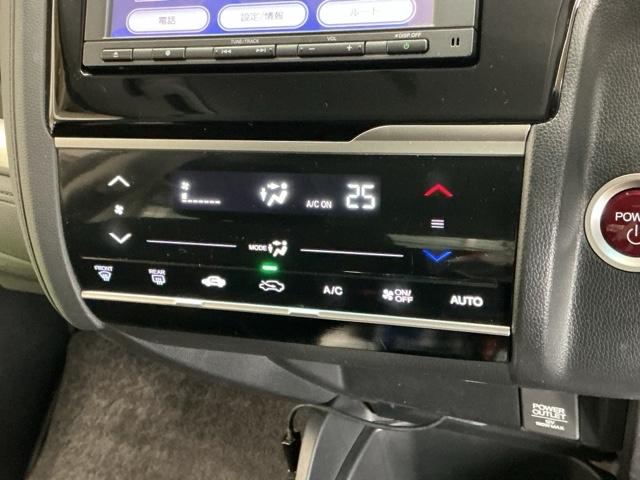 フィットハイブリッド Fパッケージ ナビ Rカメラ ブルートゥース TV CD 盗難警報装置 記録簿有り AUTOエアコン 助手席エアバック ECON ETC付き リヤカメラ ABS付 横滑り防止システム キーレスエントリー ワンセグ(14枚目)