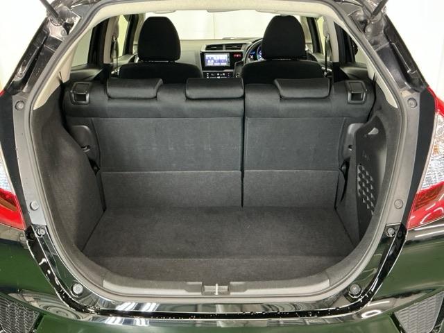 フィットハイブリッド Fパッケージ ナビ Rカメラ ブルートゥース TV CD 盗難警報装置 記録簿有り AUTOエアコン 助手席エアバック ECON ETC付き リヤカメラ ABS付 横滑り防止システム キーレスエントリー ワンセグ(24枚目)