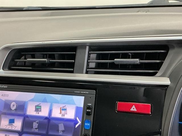 フィットハイブリッド Fパッケージ ナビ Rカメラ ブルートゥース TV CD 盗難警報装置 記録簿有り AUTOエアコン 助手席エアバック ECON ETC付き リヤカメラ ABS付 横滑り防止システム キーレスエントリー ワンセグ(55枚目)