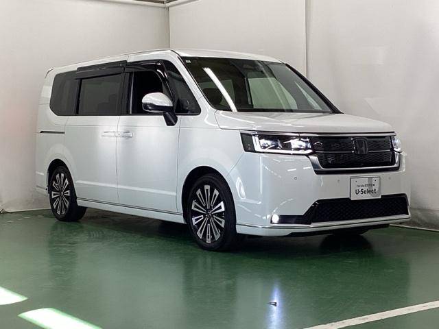 ステップワゴン ｅ：ＨＥＶスパーダプレミアムライン　ナビ　Ｒカメラ　後席モニター　フルセグＴＶ　マルチカメラ　Ｐテールゲート　両側自動ドア　Ｆセグ　ＵＳＢ接続　クリアランスソナ　クルーズＣ　助手席エアバッグ　スマートＫ　シ－トヒ－タ－　ＤＶＤ再生（7枚目）