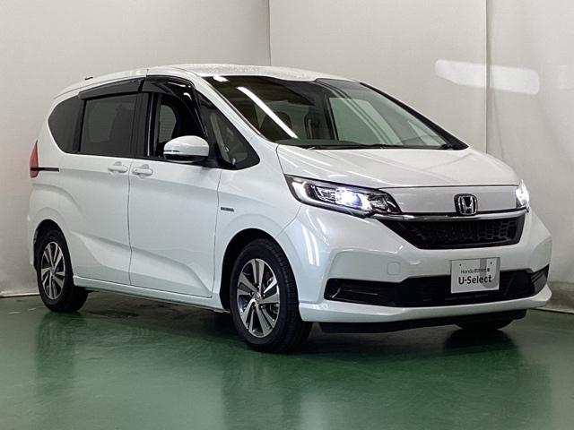 フリードハイブリッド ハイブリッド・Ｇホンダセンシング　ドラレコ　ナビ　Ｒカメラ　ブルートゥース　軽減ブレーキ　キーフリーシステム　記録簿　ＤＶＤ再生可能　ＥＣＯＮ　後カメラ　Ａクルーズ　地デジフルセグＴＶ　ＬＥＤヘッドランプ　シートＨ　横滑防止　ＵＳＢ（7枚目）
