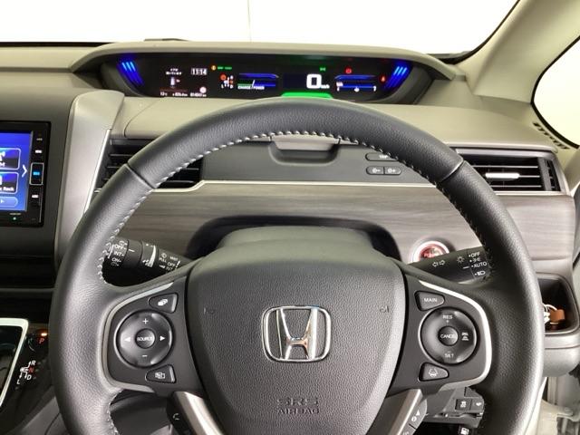 フリードハイブリッド ハイブリッド・Ｇホンダセンシング　ドラレコ　ナビ　Ｒカメラ　ブルートゥース　軽減ブレーキ　キーフリーシステム　記録簿　ＤＶＤ再生可能　ＥＣＯＮ　後カメラ　Ａクルーズ　地デジフルセグＴＶ　ＬＥＤヘッドランプ　シートＨ　横滑防止　ＵＳＢ（24枚目）