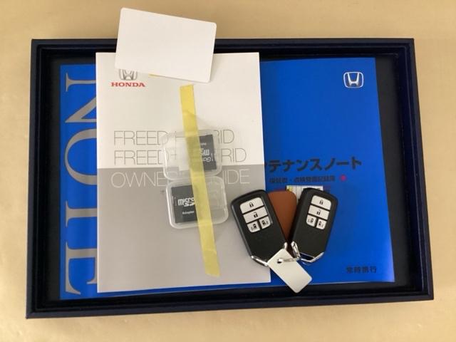 フリードハイブリッド ハイブリッド・Ｇホンダセンシング　ドラレコ　ナビ　Ｒカメラ　ブルートゥース　軽減ブレーキ　キーフリーシステム　記録簿　ＤＶＤ再生可能　ＥＣＯＮ　後カメラ　Ａクルーズ　地デジフルセグＴＶ　ＬＥＤヘッドランプ　シートＨ　横滑防止　ＵＳＢ（30枚目）