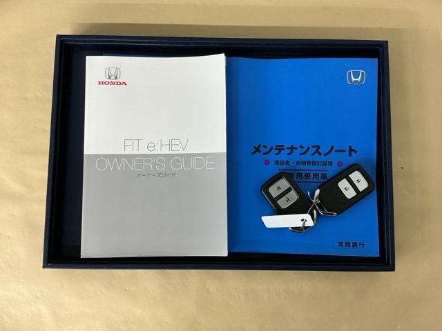 フィット ｅ：ＨＥＶホーム　ドラレコ　ナビ　Ｒカメラ　ブルートゥース　前後誤発進抑制機能　助手席エアバッグ　運転席エアバッグ　アイドリングストップ　ＬＥＤライト　ＵＳＢ接続　バックカメラ　ＡＢＳ　サイドエアバッグ　フルセグＴＶ（27枚目）