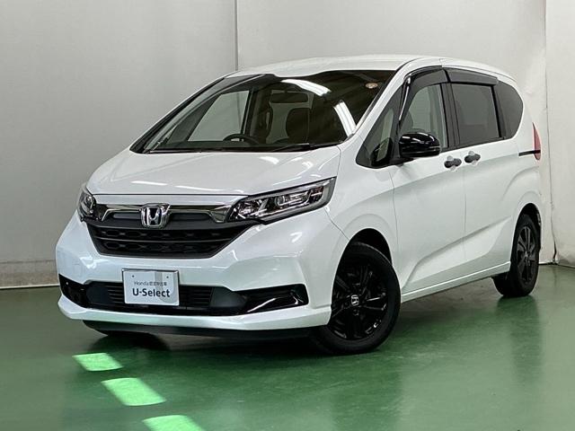 フリードハイブリッド ハイブリッド・Ｇブラックスタイル　ナビ　Ｒカメラ　ブルートゥース　フルセグ　Ｗ電動ドア　衝突軽減ブレーキ　オートクルーズコントロール　シートヒータ　盗難防止装置　キーフリー　３列シート　ウォークスルー　ＬＥＤヘッドランプ　ＤＶＤ再生可（10枚目）