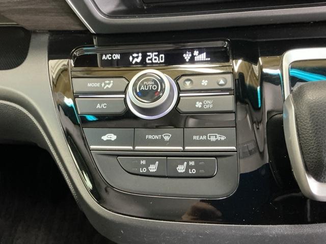 フリードハイブリッド ハイブリッド・Ｇブラックスタイル　ナビ　Ｒカメラ　ブルートゥース　フルセグ　Ｗ電動ドア　衝突軽減ブレーキ　オートクルーズコントロール　シートヒータ　盗難防止装置　キーフリー　３列シート　ウォークスルー　ＬＥＤヘッドランプ　ＤＶＤ再生可（15枚目）