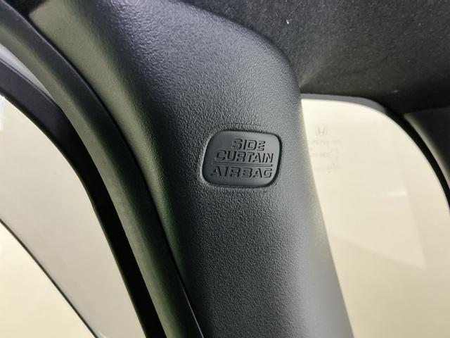 N-BOXカスタム L ナビ Rカメラ ブルートゥース フルセグ 両席エアバック Bモニタ ブレーキサポート セキュリティー LEDランプ キーレスエントリー 記録簿 SRS 横滑り防止機能 片側電動両側スライドドア PW(52枚目)