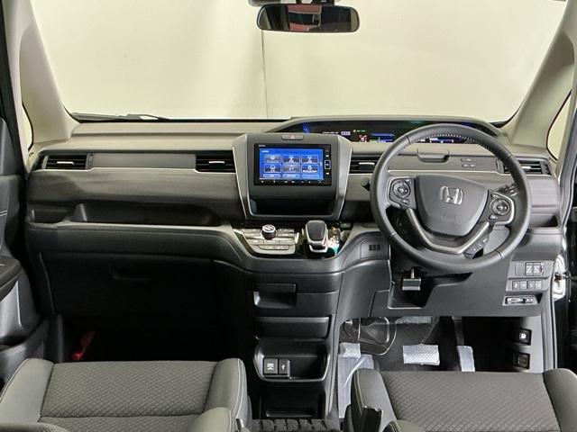 フリードハイブリッド ハイブリッド・Ｇホンダセンシング　ドラレコ　ナビ　Ｒカメラ　ブルートゥース　クルーズＣ　ＤＶＤ視聴　ＵＳＢ接続　ブレーキサポート　ＬＥＤヘットライト　Ｗエアバック　記録簿付き　バックモニタ　アイストップ　地デジフルセグ　キーレス　３列（2枚目）