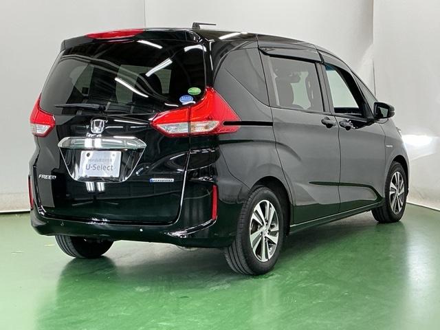 フリードハイブリッド ハイブリッド・Ｇホンダセンシング　ドラレコ　ナビ　Ｒカメラ　ブルートゥース　クルーズＣ　ＤＶＤ視聴　ＵＳＢ接続　ブレーキサポート　ＬＥＤヘットライト　Ｗエアバック　記録簿付き　バックモニタ　アイストップ　地デジフルセグ　キーレス　３列（9枚目）