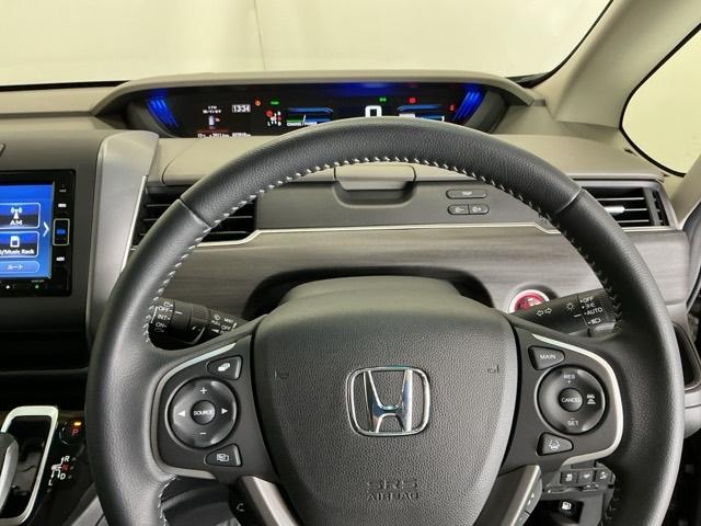 フリードハイブリッド ハイブリッド・Ｇホンダセンシング　ドラレコ　ナビ　Ｒカメラ　ブルートゥース　クルーズＣ　ＤＶＤ視聴　ＵＳＢ接続　ブレーキサポート　ＬＥＤヘットライト　Ｗエアバック　記録簿付き　バックモニタ　アイストップ　地デジフルセグ　キーレス　３列（23枚目）