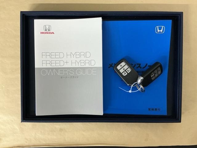 フリードハイブリッド ハイブリッド・Ｇホンダセンシング　ドラレコ　ナビ　Ｒカメラ　ブルートゥース　クルーズＣ　ＤＶＤ視聴　ＵＳＢ接続　ブレーキサポート　ＬＥＤヘットライト　Ｗエアバック　記録簿付き　バックモニタ　アイストップ　地デジフルセグ　キーレス　３列（34枚目）