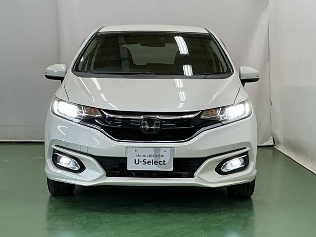 フィットハイブリッド Ｌホンダセンシング　ナビ　Ｒカメラ　ブルートゥース　フルセグ　ヘッドライトＬＥＤ　セキュリティアラーム　運転席エアバッグ　記録簿　横滑り防止機能　サイドエアバッグ　ＤＶＤ再生　キーレス　オートクルーズ　ＥＴＣ車載器（6枚目）