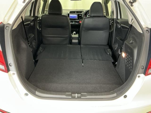 フィットハイブリッド Ｌホンダセンシング　ナビ　Ｒカメラ　ブルートゥース　フルセグ　ヘッドライトＬＥＤ　セキュリティアラーム　運転席エアバッグ　記録簿　横滑り防止機能　サイドエアバッグ　ＤＶＤ再生　キーレス　オートクルーズ　ＥＴＣ車載器（29枚目）