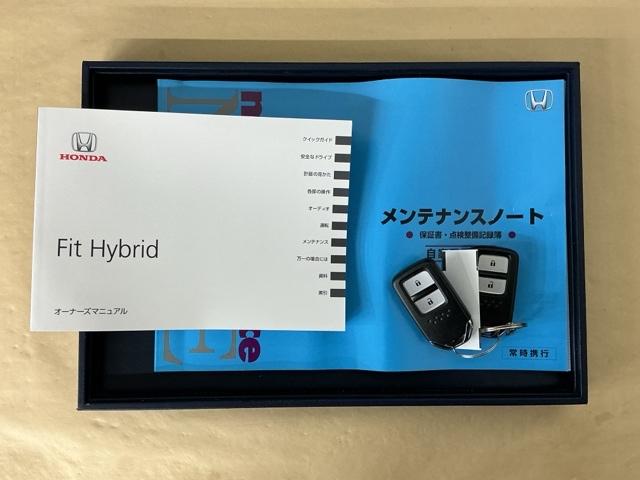 フィットハイブリッド Ｌホンダセンシング　ナビ　Ｒカメラ　ブルートゥース　フルセグ　ヘッドライトＬＥＤ　セキュリティアラーム　運転席エアバッグ　記録簿　横滑り防止機能　サイドエアバッグ　ＤＶＤ再生　キーレス　オートクルーズ　ＥＴＣ車載器（30枚目）