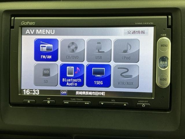 Ｎ－ＷＧＮ Ｇ・Ａパッケージ　ナビ　Ｒカメラ　ブルートゥース　ＥＴＣ　アイドリングＳ　バックカメラ付き　運転席助手席エアバッグ　ワンセグテレビ　盗難防止　カーテンエアバック　記録簿　キーレス　横滑り防止　エアコン　ベンチシート（11枚目）