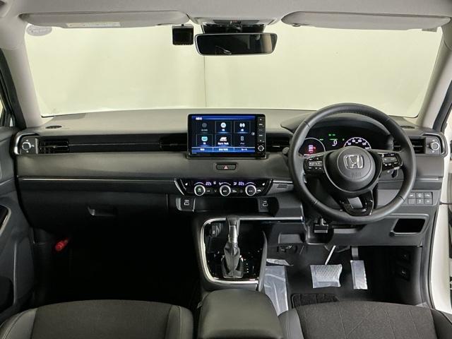 ヴェゼル e:HEVZ ドラレコ ナビ Rカメラ ブルートゥース Sヒータ 地デジフルセグTV 定期点検記録簿 電動テールゲート サイドエアバッグ 後カメラ 前後障害物センサー 横滑防止装置 エアコン LEDヘットライト(2枚目)