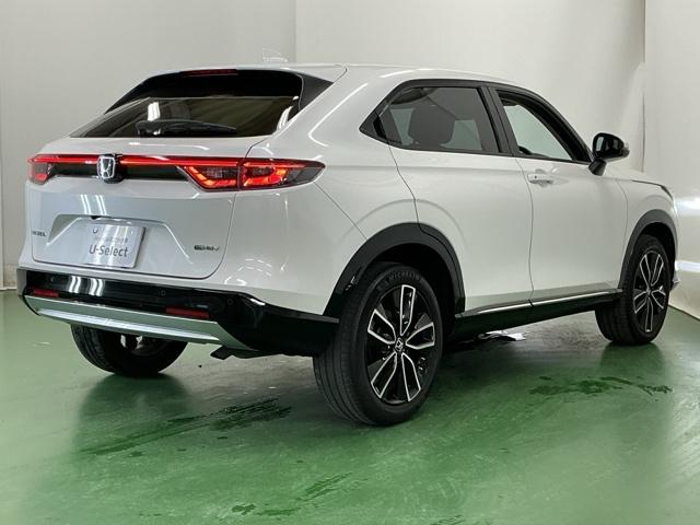 ヴェゼル e:HEVZ ドラレコ ナビ Rカメラ ブルートゥース Sヒータ 地デジフルセグTV 定期点検記録簿 電動テールゲート サイドエアバッグ 後カメラ 前後障害物センサー 横滑防止装置 エアコン LEDヘットライト(8枚目)