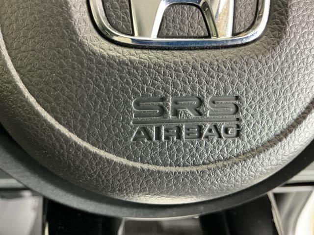 ヴェゼル e:HEVZ ドラレコ ナビ Rカメラ ブルートゥース Sヒータ 地デジフルセグTV 定期点検記録簿 電動テールゲート サイドエアバッグ 後カメラ 前後障害物センサー 横滑防止装置 エアコン LEDヘットライト(54枚目)