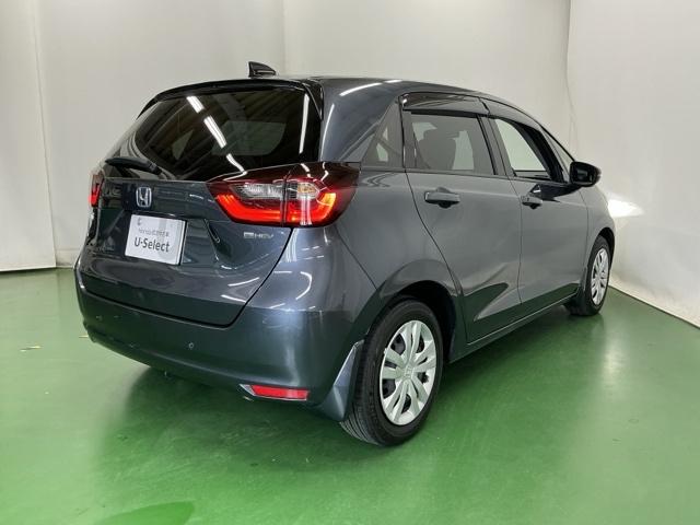 フィット ｅ：ＨＥＶホーム　ナビ　Ｒカメラ　ブルートゥース　フルセグＴＶ　Ａライト　衝突安全ボディ　電格ミラー　ＢＴオーディオ　レーダークルコン　車線維持支援システム　前後ソナー　地デジフルセグ　バックビューモニター　スマキー（9枚目）