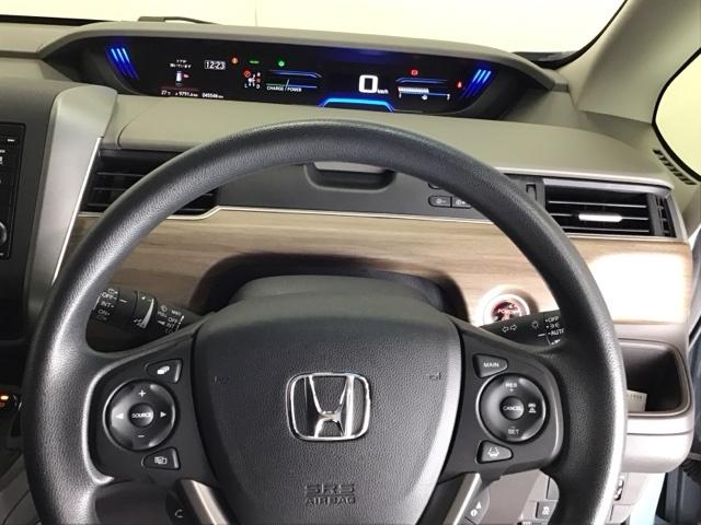 フリードハイブリッド ハイブリッド・Ｇホンダセンシング　ドラレコ　Ｒカメラ　ＥＴＣ　ワンセグ　両電動ドア　サポカー　Ｓヒーター　両席エアバック　記録簿付　ドライブレコ　リアカメラ　横滑防止　オートクルーズコントロール　エアバック　パワーウインドウ　盗難防止（24枚目）