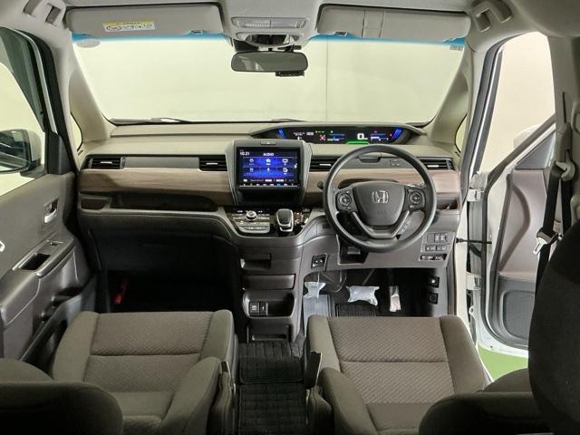 フリードハイブリッド ハイブリッド・Ｇ　ナビ　Ｒカメラ　ブルートゥース　フルセグ　福祉車輌　両電動ドア　サイドエアバック　クルコン　スマキー　パワーステアリング　ＬＥＤライト　ウォークスルー　ＥＴＣ付　フルオートエアコン　Ｂカメラ　シートＨ（2枚目）