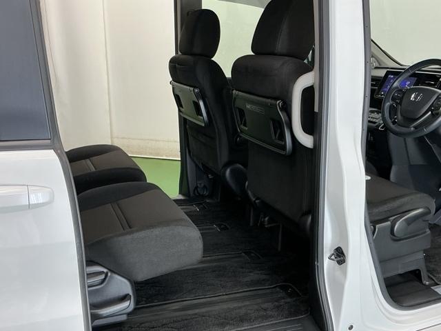 ステップワゴンスパーダ スパーダホンダセンシング ナビ Rカメラ 後席モニター フルセグ 盗難防止 助手席エアバッグ Wパワスラ 記録簿有 地デジ LEDライト 横滑り防止システム オートエアコン リアカメラ USB 三列シート アイドリングS(71枚目)
