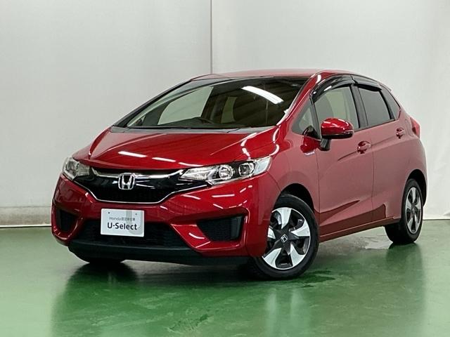 フィットハイブリッド Ｆパッケージコンフォートエディション　ナビ　Ｒカメラ　ブルートゥース　フルセグ　セキュリティアラーム　リアカメラ　ＥＴＣ車載器　エアコン　スマートキー　アイドリングストップ　キーレス　ＬＥＤ　ＶＳＡ　前席シートヒーター　ＡＢＳ　ＤＶＤ再生（10枚目）