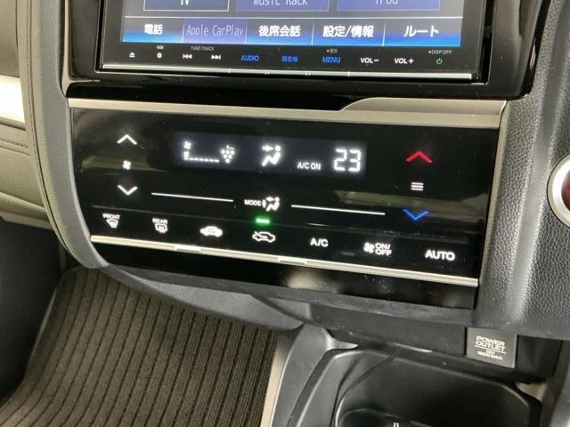 フィットハイブリッド Ｆパッケージコンフォートエディション　ナビ　Ｒカメラ　ブルートゥース　フルセグ　セキュリティアラーム　リアカメラ　ＥＴＣ車載器　エアコン　スマートキー　アイドリングストップ　キーレス　ＬＥＤ　ＶＳＡ　前席シートヒーター　ＡＢＳ　ＤＶＤ再生（15枚目）