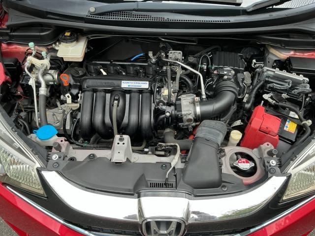 フィットハイブリッド Ｆパッケージコンフォートエディション　ナビ　Ｒカメラ　ブルートゥース　フルセグ　セキュリティアラーム　リアカメラ　ＥＴＣ車載器　エアコン　スマートキー　アイドリングストップ　キーレス　ＬＥＤ　ＶＳＡ　前席シートヒーター　ＡＢＳ　ＤＶＤ再生（28枚目）