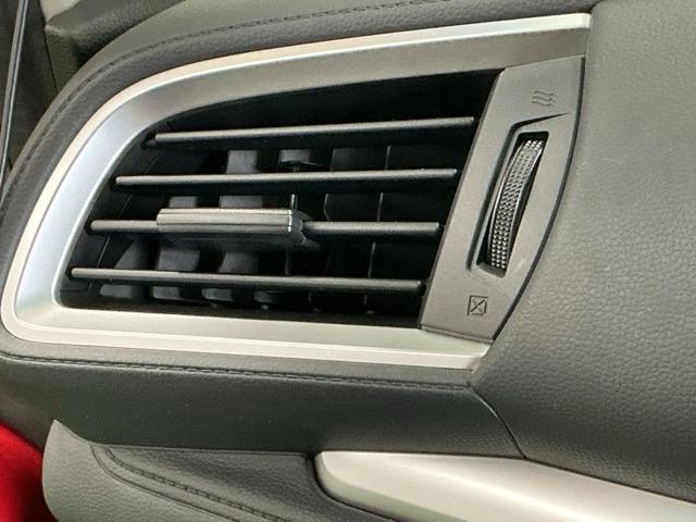 フィットハイブリッド Ｆパッケージコンフォートエディション　ナビ　Ｒカメラ　ブルートゥース　フルセグ　セキュリティアラーム　リアカメラ　ＥＴＣ車載器　エアコン　スマートキー　アイドリングストップ　キーレス　ＬＥＤ　ＶＳＡ　前席シートヒーター　ＡＢＳ　ＤＶＤ再生（51枚目）