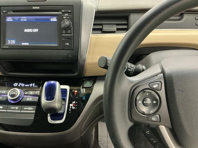 フリードハイブリッド ハイブリッド・Gホンダセンシング ドラレコ Rカメラ ワンセグTV CD ETC 軽減ブレーキ キーフリーシステム 記録簿 ECON 後カメラ Aクルーズ LEDヘッドランプ 横滑防止 ドライブレコーダ パワーウインドウ 3列シート(3枚目)