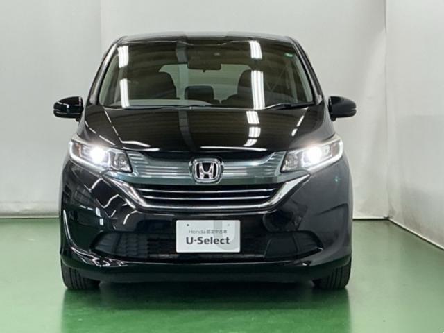 フリードハイブリッド ハイブリッド・Gホンダセンシング ドラレコ Rカメラ ワンセグTV CD ETC 軽減ブレーキ キーフリーシステム 記録簿 ECON 後カメラ Aクルーズ LEDヘッドランプ 横滑防止 ドライブレコーダ パワーウインドウ 3列シート(6枚目)