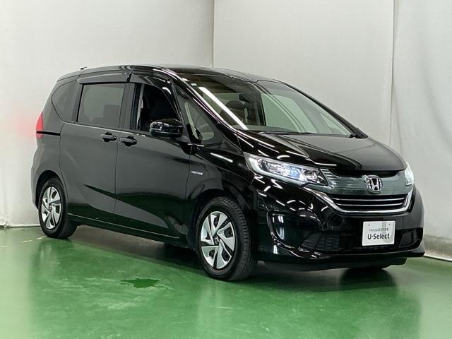 フリードハイブリッド ハイブリッド・Gホンダセンシング ドラレコ Rカメラ ワンセグTV CD ETC 軽減ブレーキ キーフリーシステム 記録簿 ECON 後カメラ Aクルーズ LEDヘッドランプ 横滑防止 ドライブレコーダ パワーウインドウ 3列シート(7枚目)