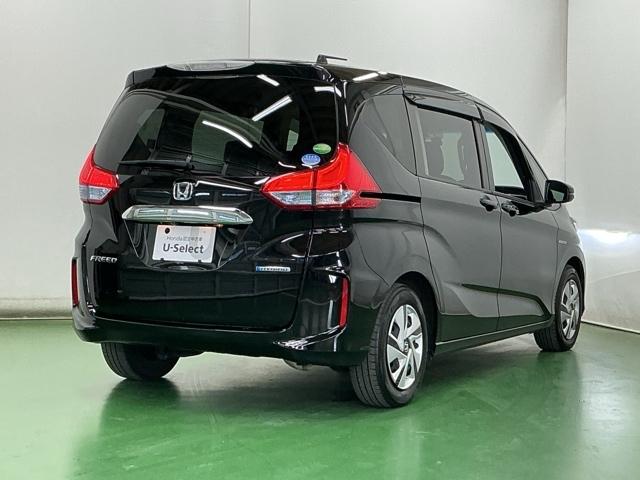 フリードハイブリッド ハイブリッド・Gホンダセンシング ドラレコ Rカメラ ワンセグTV CD ETC 軽減ブレーキ キーフリーシステム 記録簿 ECON 後カメラ Aクルーズ LEDヘッドランプ 横滑防止 ドライブレコーダ パワーウインドウ 3列シート(8枚目)