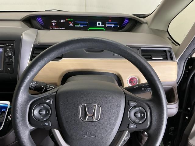 フリードハイブリッド ハイブリッド・Gホンダセンシング ドラレコ Rカメラ ワンセグTV CD ETC 軽減ブレーキ キーフリーシステム 記録簿 ECON 後カメラ Aクルーズ LEDヘッドランプ 横滑防止 ドライブレコーダ パワーウインドウ 3列シート(23枚目)