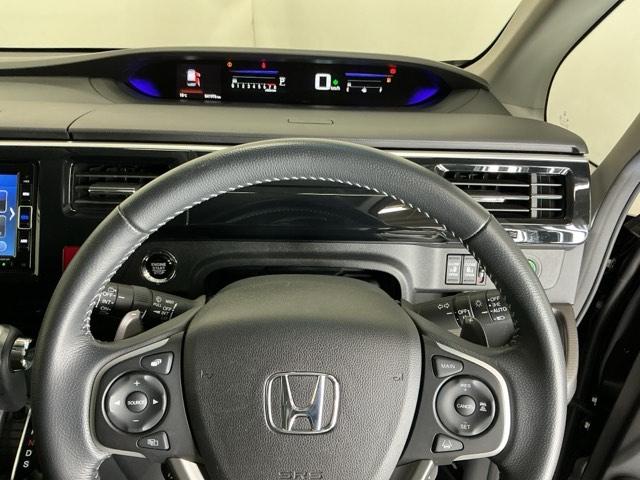 ステップワゴンスパーダ スパーダホンダセンシング　ナビ　Ｒカメラ　ブルートゥース　フルセグ　盗難防止　助手席エアバッグ　Ｗパワスラ　記録簿有　地デジ　ＬＥＤライト　横滑り防止システム　オートエアコン　リアカメラ　ＵＳＢ　三列シート　アイドリングＳ（21枚目）