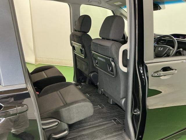 ステップワゴンスパーダ スパーダホンダセンシング　ナビ　Ｒカメラ　ブルートゥース　フルセグ　盗難防止　助手席エアバッグ　Ｗパワスラ　記録簿有　地デジ　ＬＥＤライト　横滑り防止システム　オートエアコン　リアカメラ　ＵＳＢ　三列シート　アイドリングＳ（56枚目）