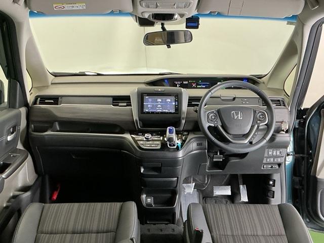 フリード＋ハイブリッド ハイブリッドＥＸ　ドラレコ　ナビ　Ｒカメラ　ブルートゥース　アクティブクルーズコントロール　サイドカーテンエアバック　前席シートヒーター　ＥＴＣ車載器　セキュリティアラーム　フルセグＴＶ　Ｂカメラ　オートエアコン（2枚目）