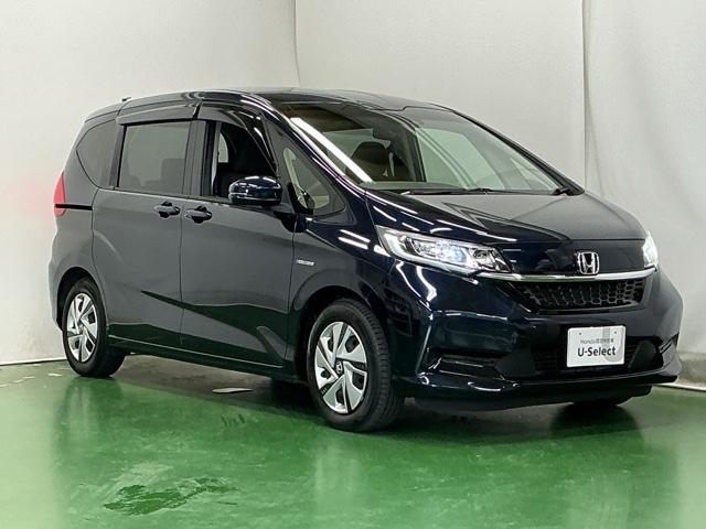 フリードハイブリッド ハイブリッド・Ｇホンダセンシング　ナビ　Ｒカメラ　ブルートゥース　フルセグ　軽減ブレーキ　キーフリーシステム　記録簿　ＤＶＤ再生可能　ＥＣＯＮ　後カメラ　Ａクルーズ　ＬＥＤヘッドランプ　横滑防止　パワーウインドウ　３列シート　ＵＳＢ（7枚目）