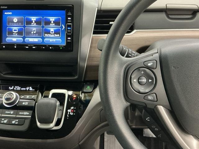 フリードハイブリッド ハイブリッド・Ｇホンダセンシング　ナビ　Ｒカメラ　ブルートゥース　フルセグ　軽減ブレーキ　キーフリーシステム　記録簿　ＤＶＤ再生可能　ＥＣＯＮ　後カメラ　Ａクルーズ　ＬＥＤヘッドランプ　シートＨ　横滑防止　パワーウインドウ　３列シート（3枚目）