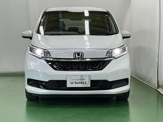 フリードハイブリッド ハイブリッド・Ｇホンダセンシング　ナビ　Ｒカメラ　ブルートゥース　フルセグ　軽減ブレーキ　キーフリーシステム　記録簿　ＤＶＤ再生可能　ＥＣＯＮ　後カメラ　Ａクルーズ　ＬＥＤヘッドランプ　シートＨ　横滑防止　パワーウインドウ　３列シート（6枚目）