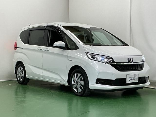 フリードハイブリッド ハイブリッド・Ｇホンダセンシング　ナビ　Ｒカメラ　ブルートゥース　フルセグ　軽減ブレーキ　キーフリーシステム　記録簿　ＤＶＤ再生可能　ＥＣＯＮ　後カメラ　Ａクルーズ　ＬＥＤヘッドランプ　シートＨ　横滑防止　パワーウインドウ　３列シート（7枚目）
