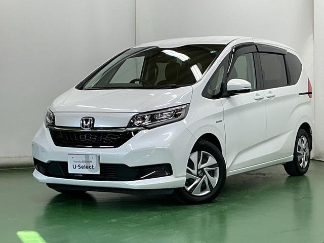 フリードハイブリッド ハイブリッド・Ｇホンダセンシング　ナビ　Ｒカメラ　ブルートゥース　フルセグ　軽減ブレーキ　キーフリーシステム　記録簿　ＤＶＤ再生可能　ＥＣＯＮ　後カメラ　Ａクルーズ　ＬＥＤヘッドランプ　シートＨ　横滑防止　パワーウインドウ　３列シート（10枚目）
