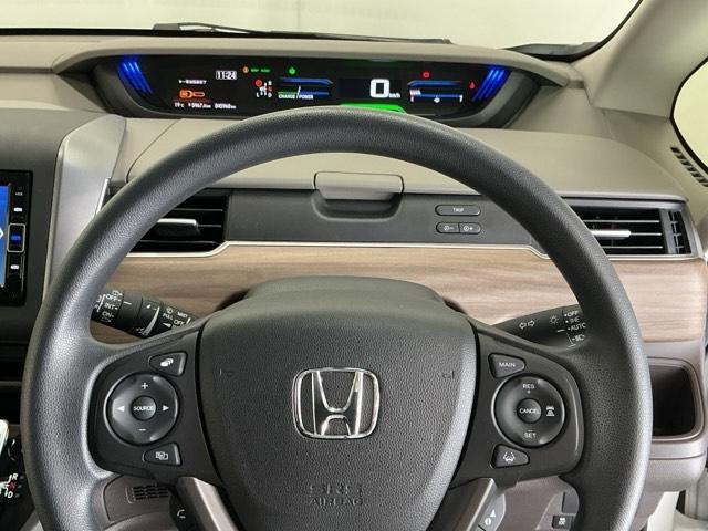 フリードハイブリッド ハイブリッド・Ｇホンダセンシング　ナビ　Ｒカメラ　ブルートゥース　フルセグ　軽減ブレーキ　キーフリーシステム　記録簿　ＤＶＤ再生可能　ＥＣＯＮ　後カメラ　Ａクルーズ　ＬＥＤヘッドランプ　シートＨ　横滑防止　パワーウインドウ　３列シート（23枚目）
