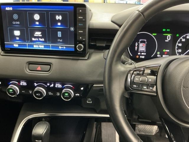 ヴェゼル ｅ：ＨＥＶＺ　ドラレコ　ナビ　Ｒカメラ　ブルートゥース　スマートキー＆プッシュスタート　サイドＳＲＳ　オートテールゲート　イモビ　地デジ　Ｂカメ　キーレスエントリー　Ｃソナー　ＵＳＢポート　ＰＳ　ＬＥＤライト　ＰＷ（3枚目）