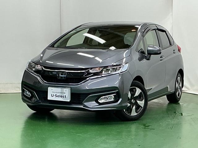 フィットハイブリッド Ｌホンダセンシング　ドラレコ　ナビ　Ｒカメラ　ブルートゥース　軽減ブレーキ　ＬＥＤ　サイドＳＲＳ　横滑り防止　ドライブレコーダー　フルセグテレビ　記録簿　パワーステアリング　盗難防止装置　オートクルーズ　ＥＴＣ車載器（10枚目）