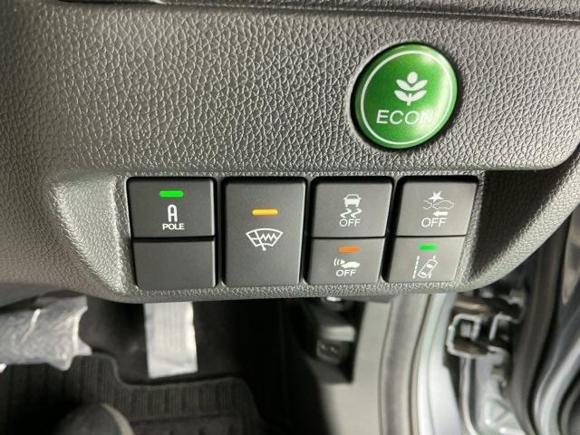 フィットハイブリッド Ｌホンダセンシング　ドラレコ　ナビ　Ｒカメラ　ブルートゥース　軽減ブレーキ　ＬＥＤ　サイドＳＲＳ　横滑り防止　ドライブレコーダー　フルセグテレビ　記録簿　パワーステアリング　盗難防止装置　オートクルーズ　ＥＴＣ車載器（25枚目）