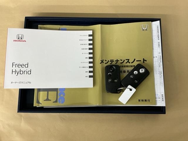 フリードハイブリッド ジャストセレクション　ナビ　Ｒカメラ　ブルートゥース　フルセグ　セキュリティー　横滑り防止機能　記録簿　地デジ　エアバック　ＤＶＤ再生可能　キーレスエントリー　ＰＳ　ＥＴＣ　３列　サイドカーテンエアバック　ＡＢＳ（27枚目）