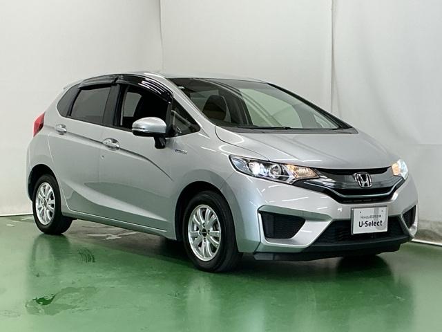 フィットハイブリッド Ｌパッケージ　ナビ　ＤＶＤ　ＣＤ　ワンセグＴＶ　ＥＴＣ　ＬＥＤ　ＥＣＯＮ　オートクルーズコントロール　イモビライザー　１セグＴＶ　ＥＳＣ　ＡＵＴＯエアコン　ＡＢＳ　運転席助手席エアバッグ　運転席エアバック（7枚目）