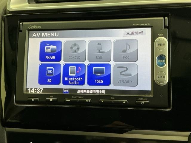 フィットハイブリッド Ｌパッケージ　ナビ　ＤＶＤ　ＣＤ　ワンセグＴＶ　ＥＴＣ　ＬＥＤ　ＥＣＯＮ　オートクルーズコントロール　イモビライザー　１セグＴＶ　ＥＳＣ　ＡＵＴＯエアコン　ＡＢＳ　運転席助手席エアバッグ　運転席エアバック（11枚目）